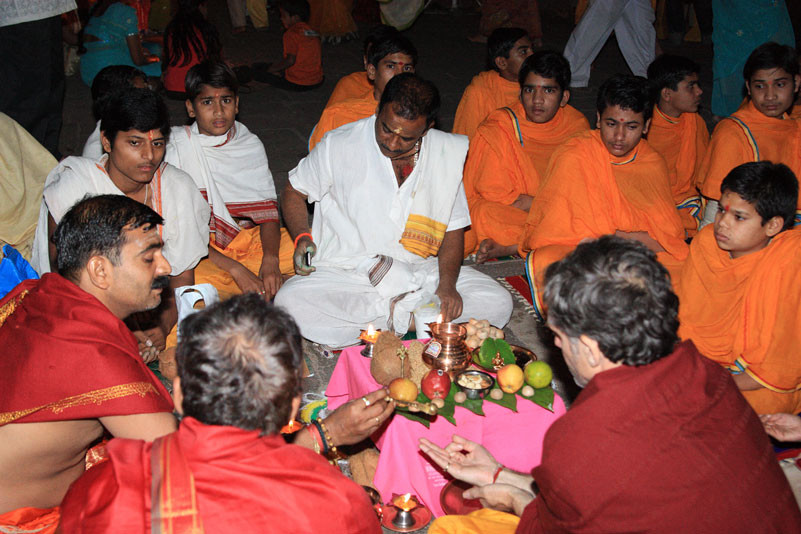 Maha Shiva Rati celebration, Ganesh and many pandits sitting in a circle performing pooja.